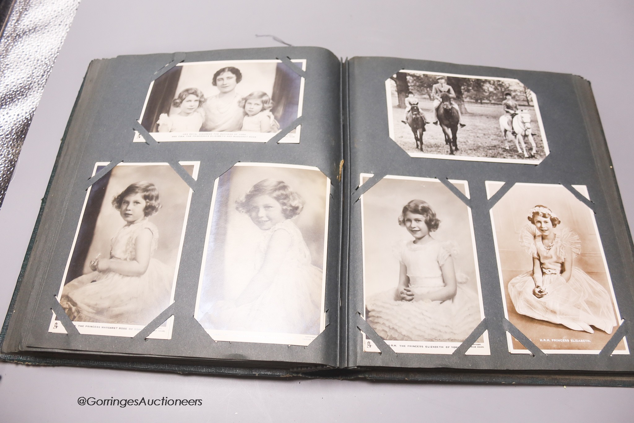 A Stevenograph type portrait album of Royals postcards and a Victorian portrait miniature